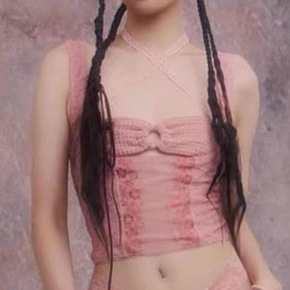 Pink lace type top with ribbon in back Size L